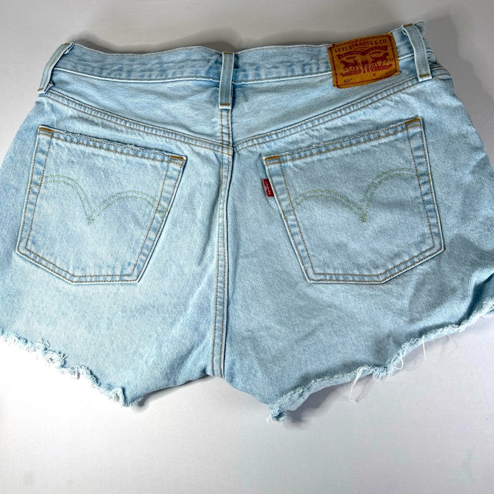 Women’s Levi’s 501 waist 31 white washed blue jean cut off shorts